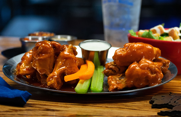 Sauced Bone-In Wings Sauced Bone-In Wings